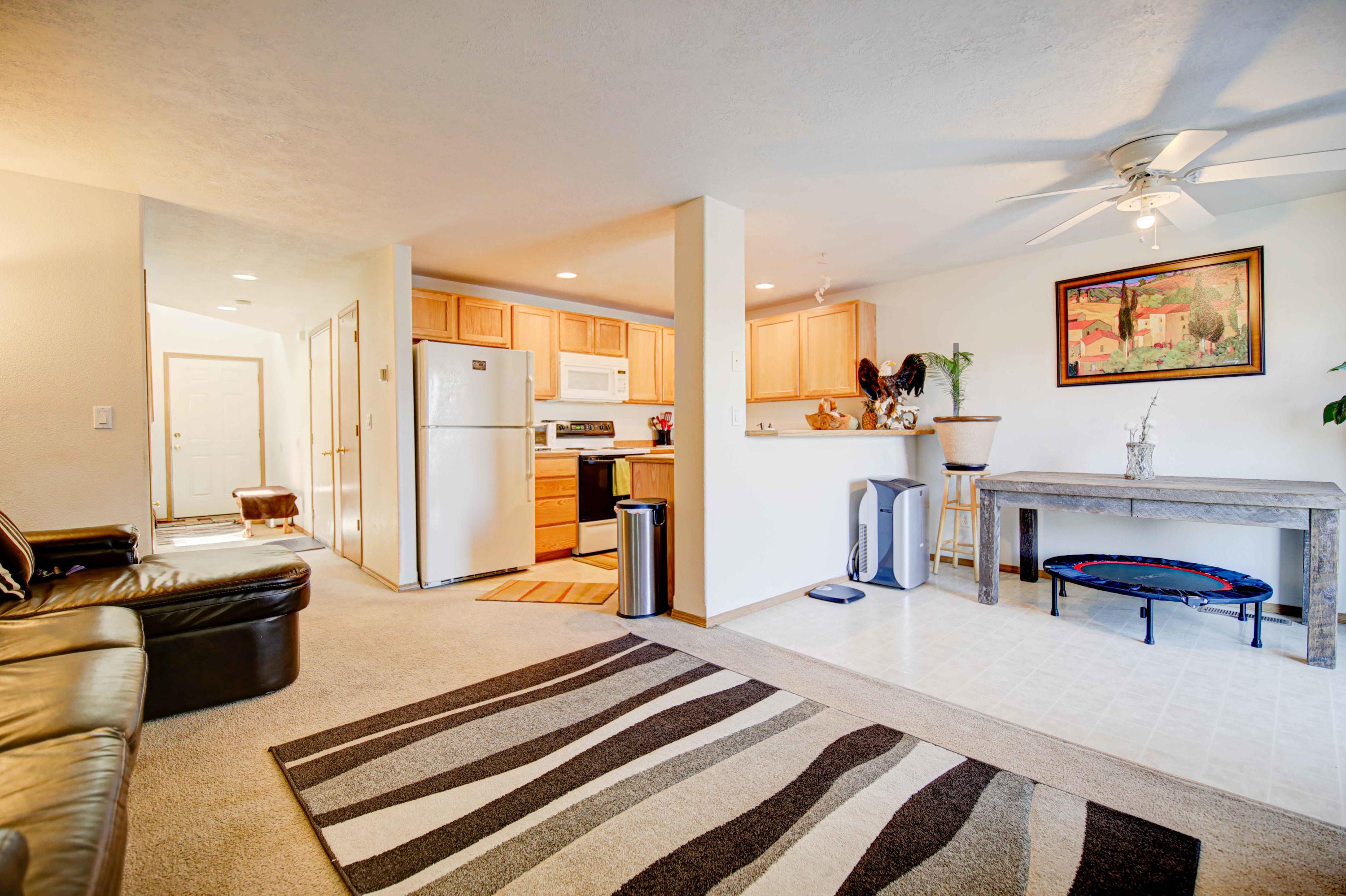 1446 Southwest 16th Street Redmond, OR 97756 - Photo 6 of 17 View from living area towards kitchen and dining.