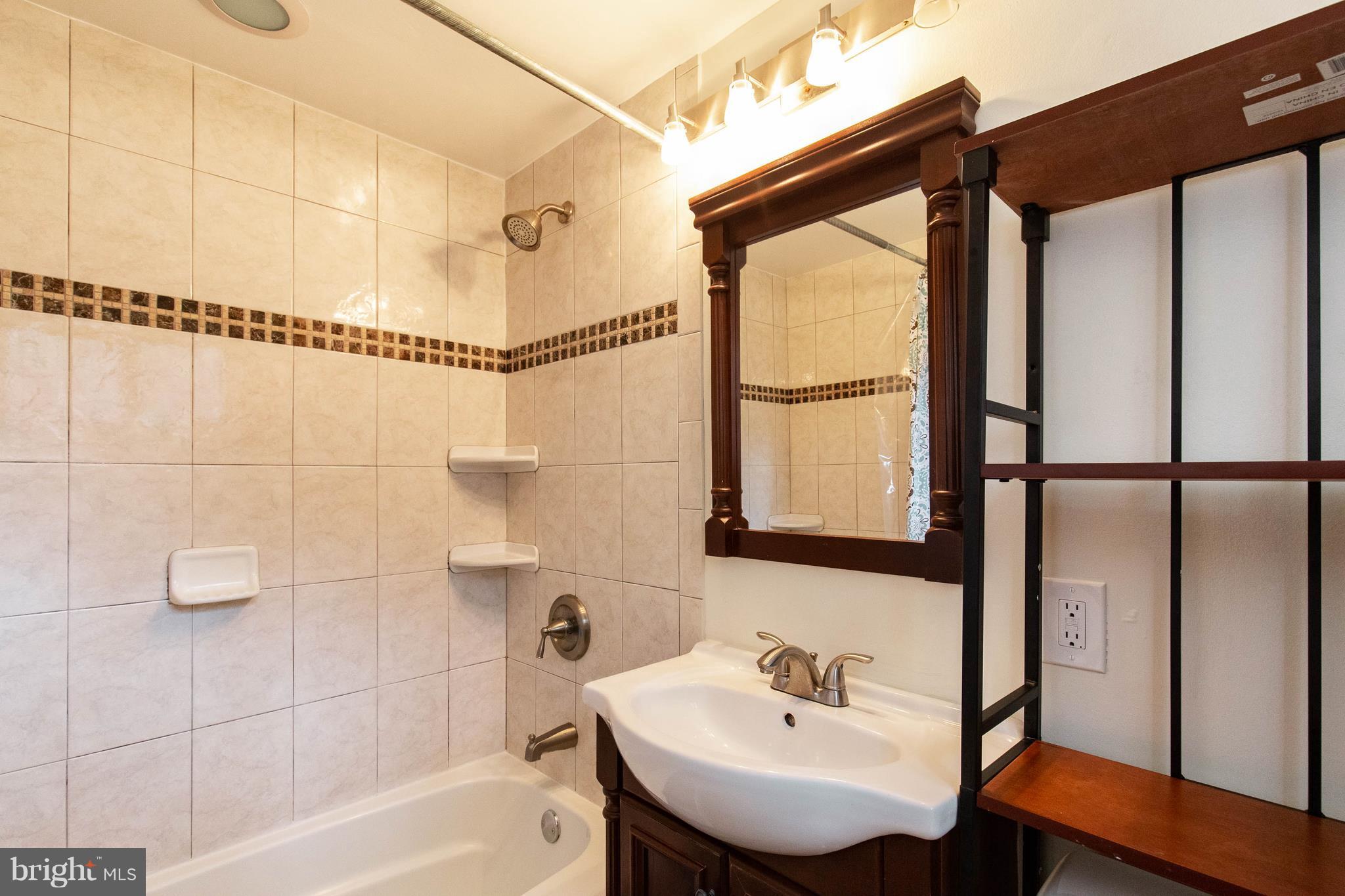 3702 Gunston Road, Unit 920 Alexandria, VA 22302 - Photo 25 of 28 Updated Master Bathroom