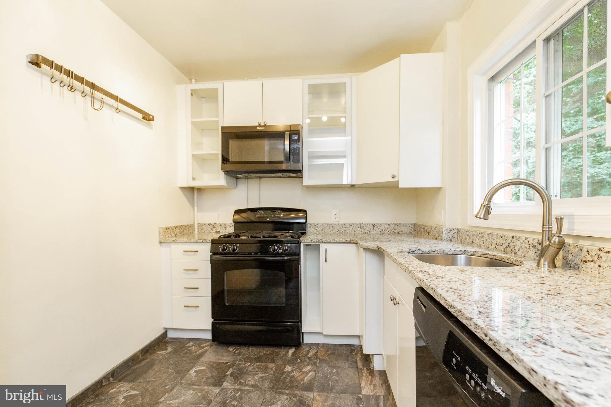 3702 Gunston Road, Unit 920 Alexandria, VA 22302 - Photo 4 of 28 Updated Kitchen With Tile Floors