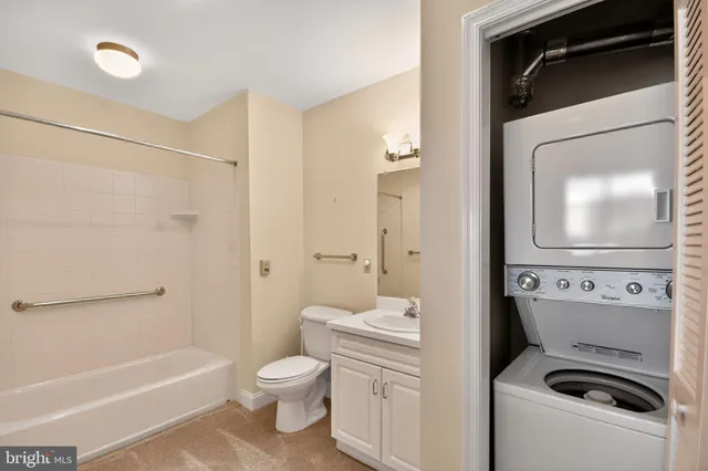 a bathroom with a toilet sink and bathtub