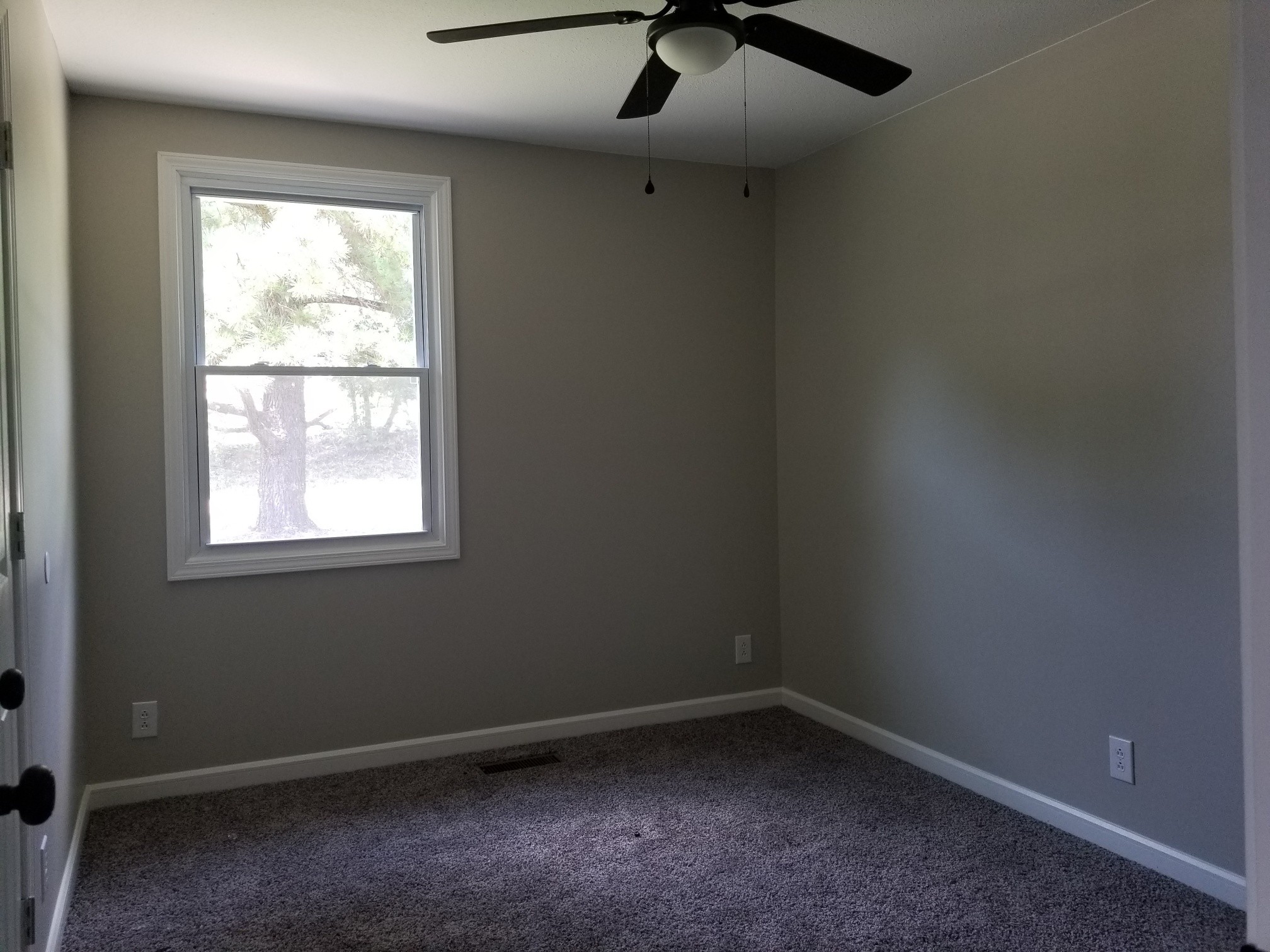 4440 Old Metal Road Palmyra, TN 37142 - Photo 14 of 21 an empty room with a window