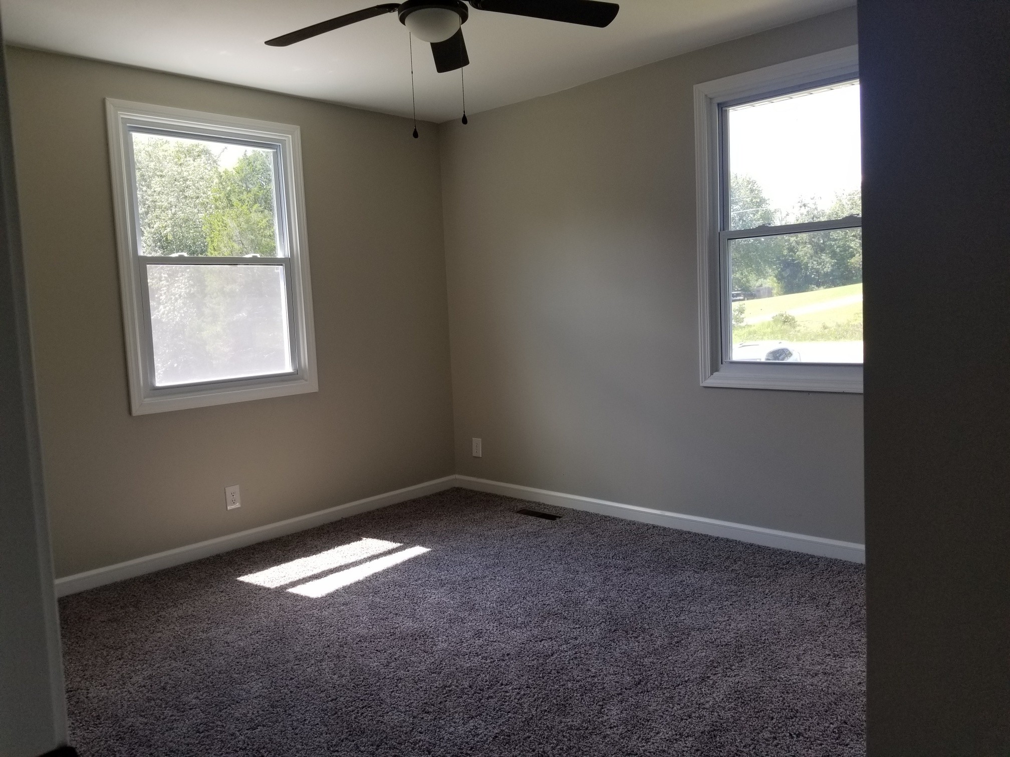 4440 Old Metal Road Palmyra, TN 37142 - Photo 15 of 21 an empty room with a window