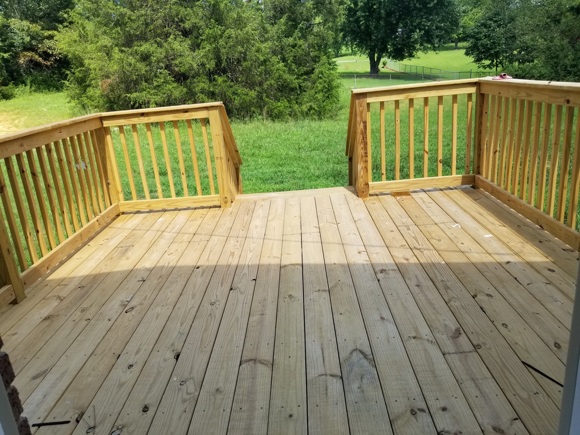 4440 Old Metal Road Palmyra, TN 37142 - Photo 10 of 21 a view of backyard with wooden floor and fence