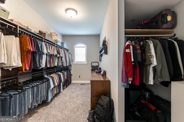 a kitchen with a sink and a stove top oven