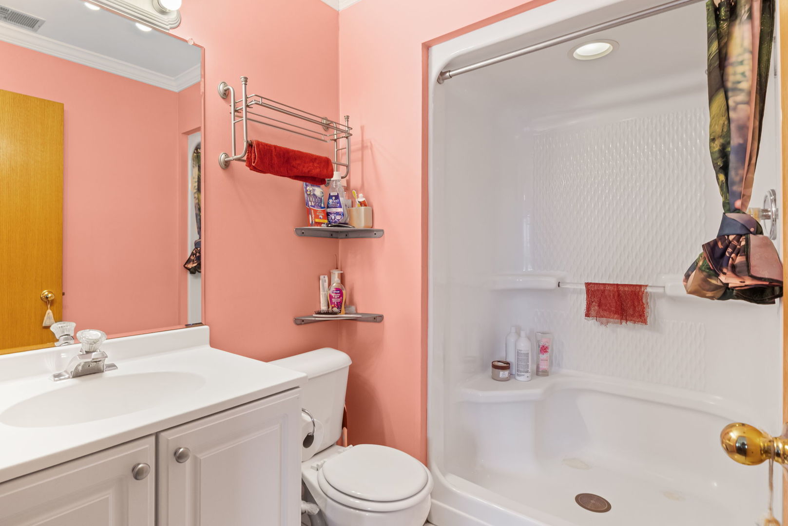 10710 Central Avenue, Unit 3D Chicago Ridge, IL 60415 - Photo 18 of 24 a bathroom with a sink a toilet and shower curtain
