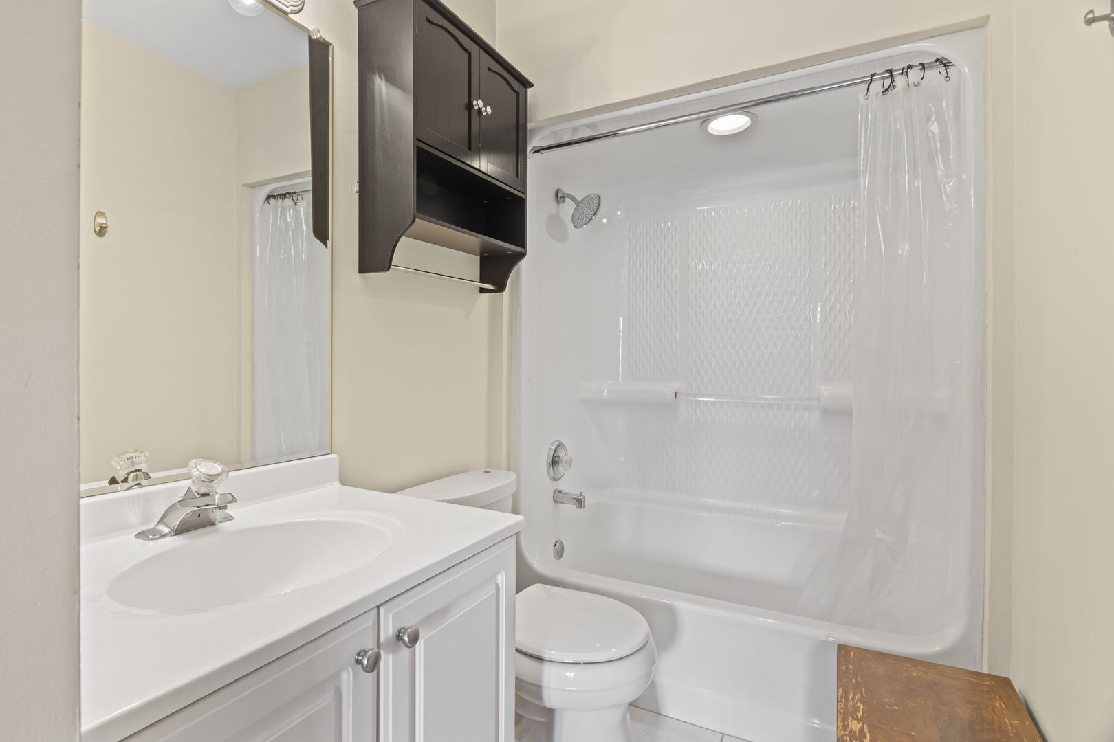 10710 Central Avenue, Unit 3D Chicago Ridge, IL 60415 - Photo 10 of 24 a bathroom with a sink toilet a mirror and shower