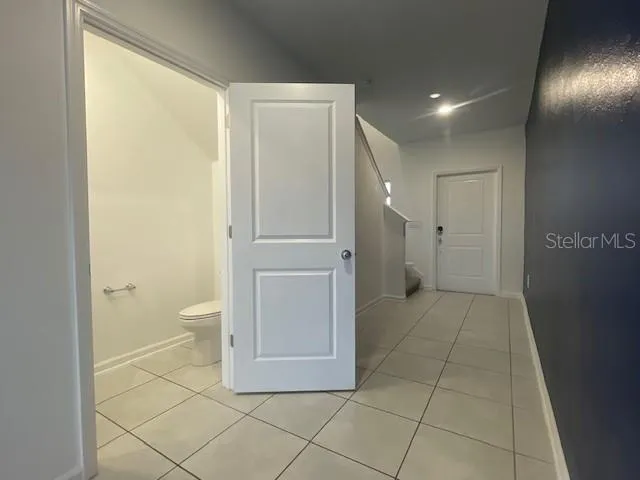 a bathroom with a shower and a toilet