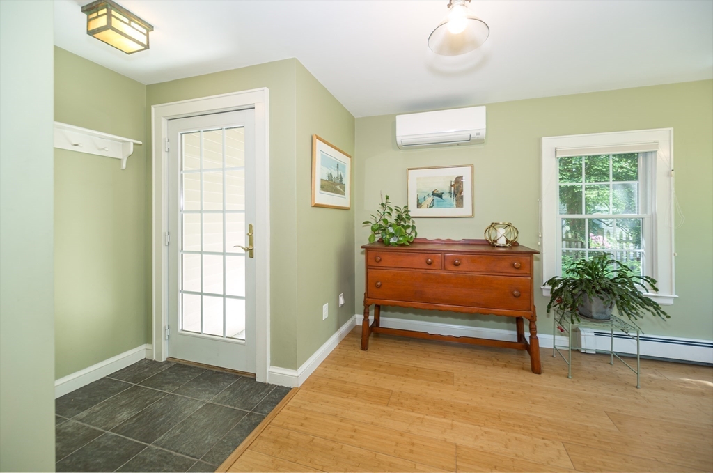 16 Beverly Road Natick, MA 01760 - Photo 18 of 37 a bedroom with furniture and a window