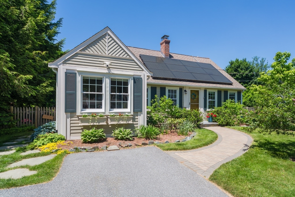 16 Beverly Road Natick, MA 01760 - Photo 2 of 37 a front view of a house with a yard