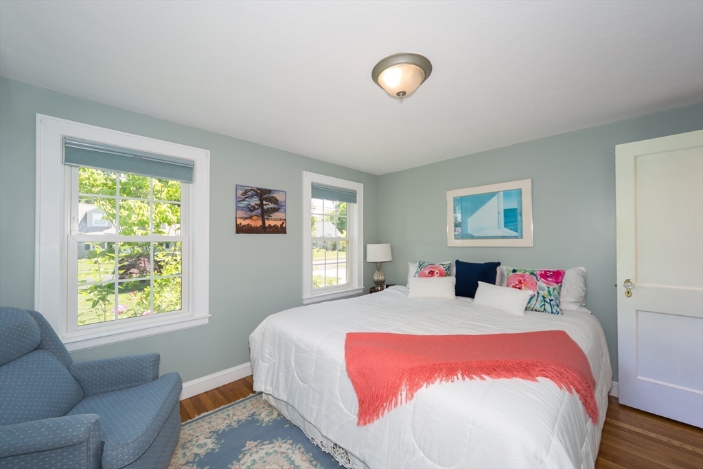 16 Beverly Road Natick, MA 01760 - Photo 24 of 37 a bedroom with a bed and a couch