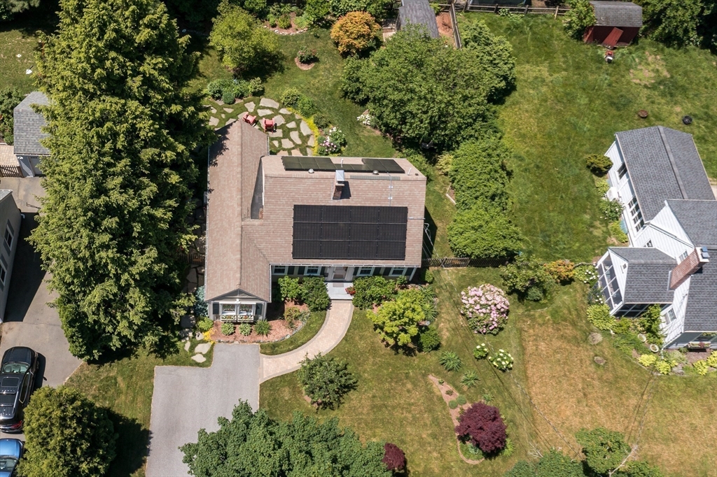 16 Beverly Road Natick, MA 01760 - Photo 36 of 37 an aerial view of a house with a yard and garden