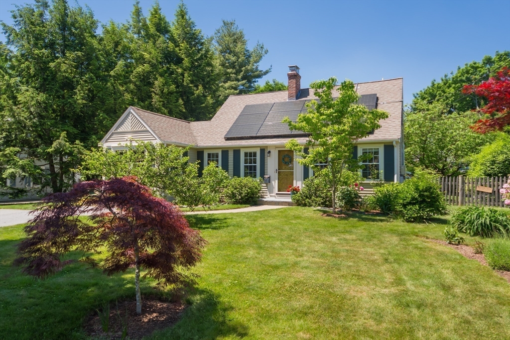 16 Beverly Road Natick, MA 01760 - Photo 6 of 37 a front view of a house with a yard