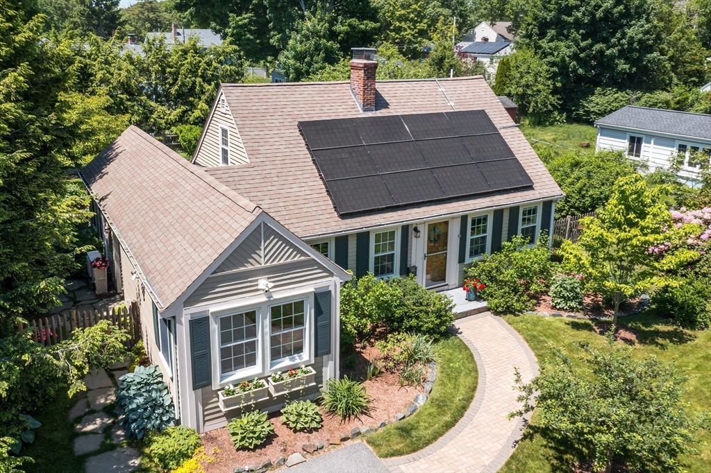 16 Beverly Road Natick, MA 01760 - Photo 8 of 37 an aerial view of a house with a yard and potted plants