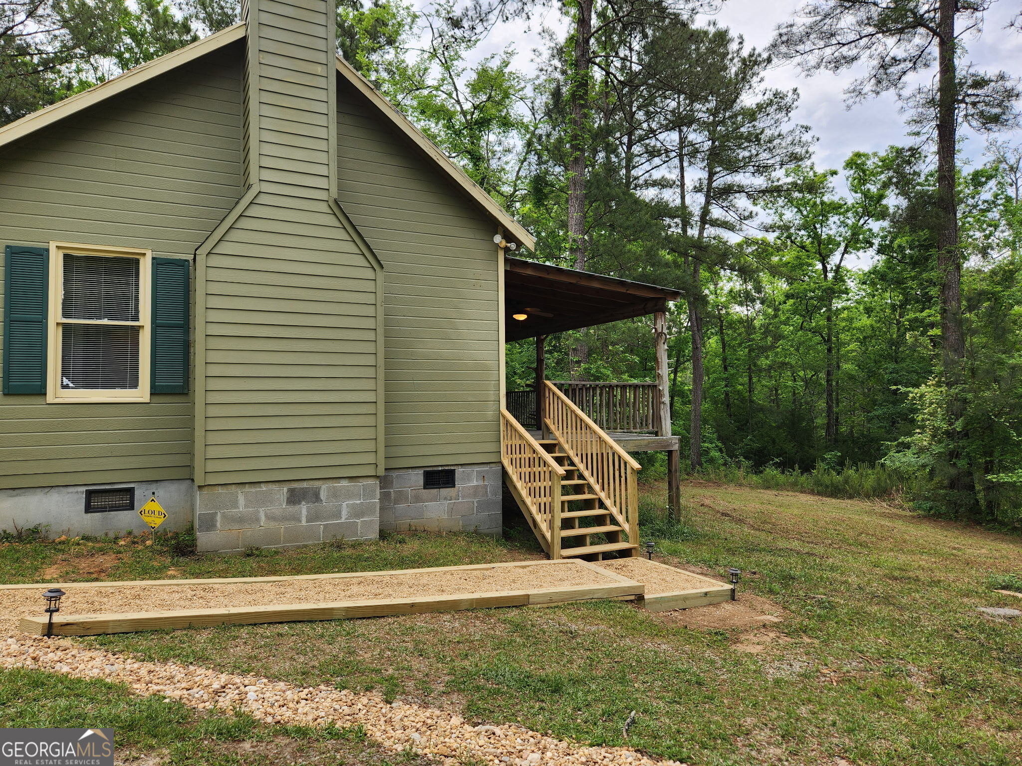 1240 A Walker Church Road Greensboro, GA 30642 - Photo 1 of 1 front view of a house with a yard