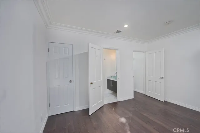a view of a livingroom with wooden floor