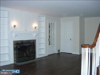 80 East Rose Tree Road Media, PA 19063 - Photo 4 of 6 a living room with a fireplace