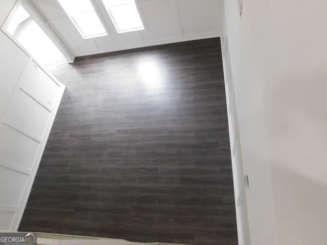 a bathroom with a sink a toilet and vanity