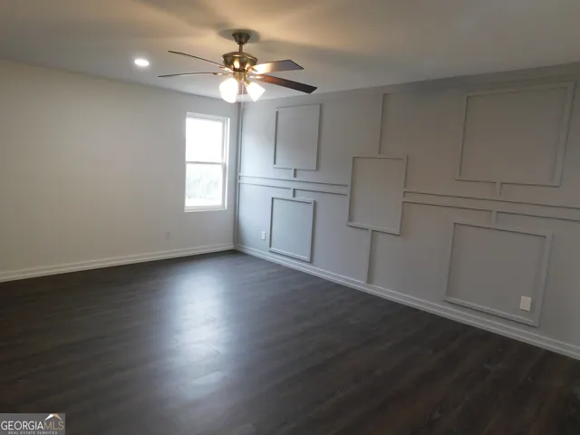 a view of room with hardwood floor