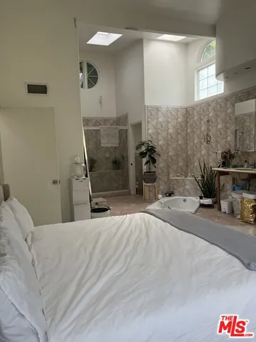 a view of a tables and chairs in patio