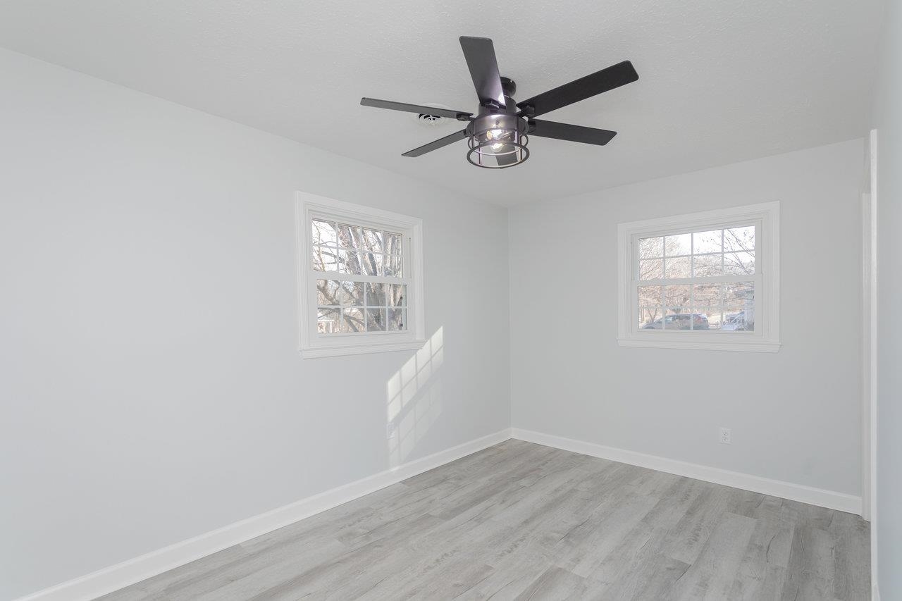 12 Essex Road Grottoes, VA 24441 - Photo 30 of 65 a view of a big room with wooden floor closet and windows