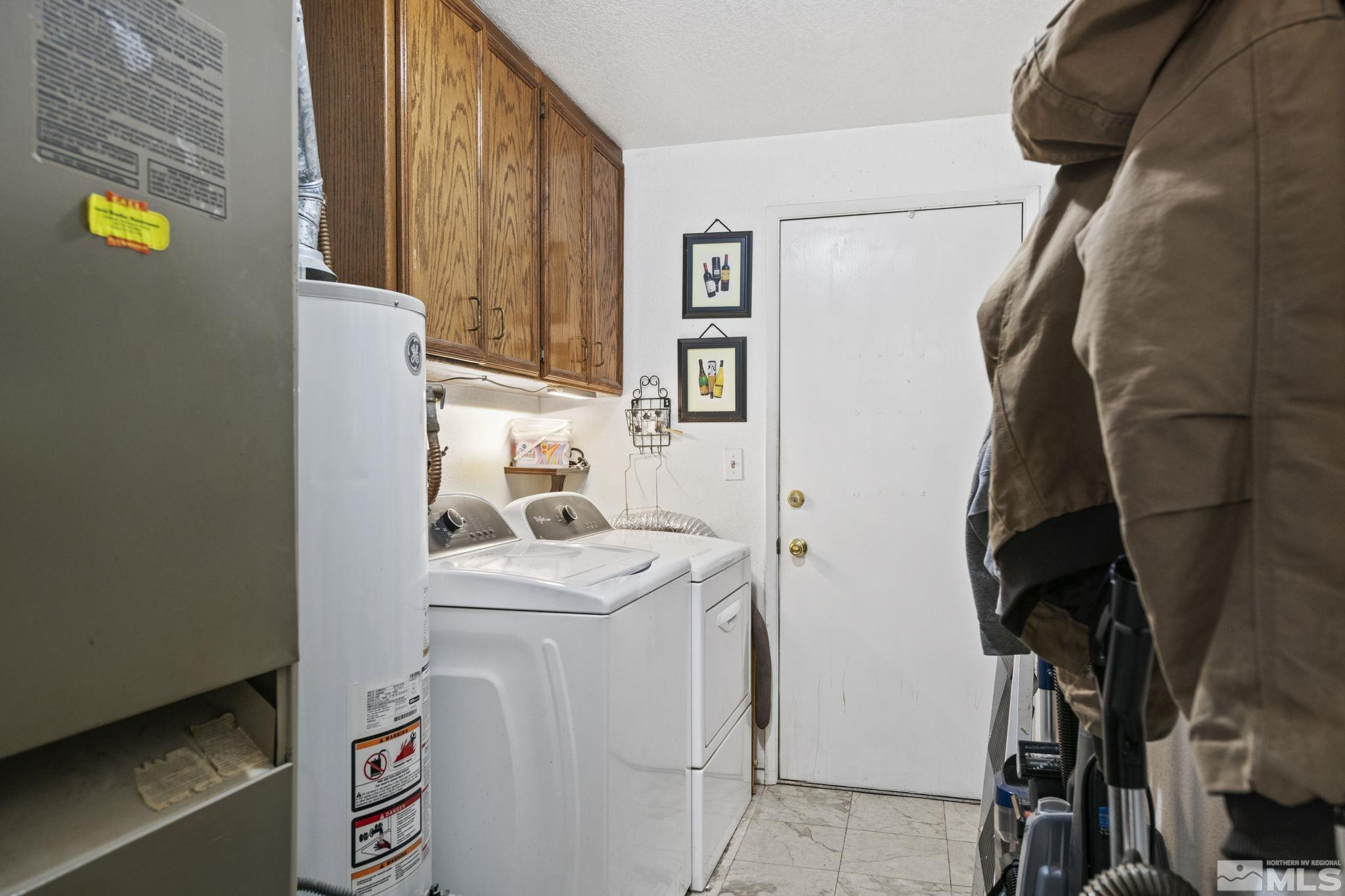 207 Ring Road Dayton, NV 89403 - Photo 11 of 40 a room with storage and utility