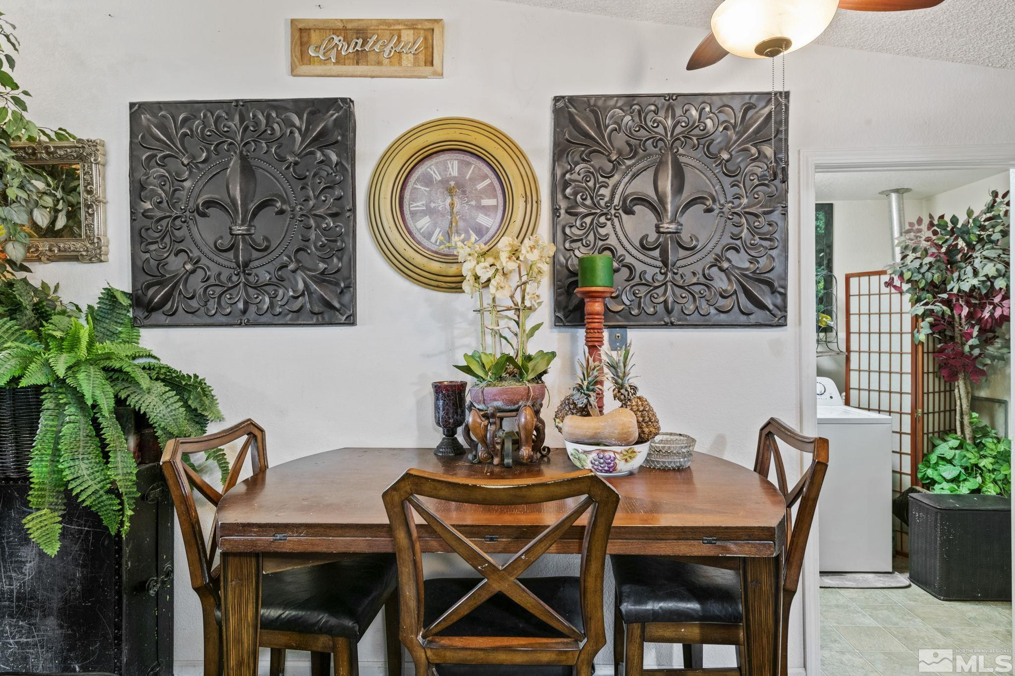 207 Ring Road Dayton, NV 89403 - Photo 14 of 40 a dining room with furniture and wooden floor