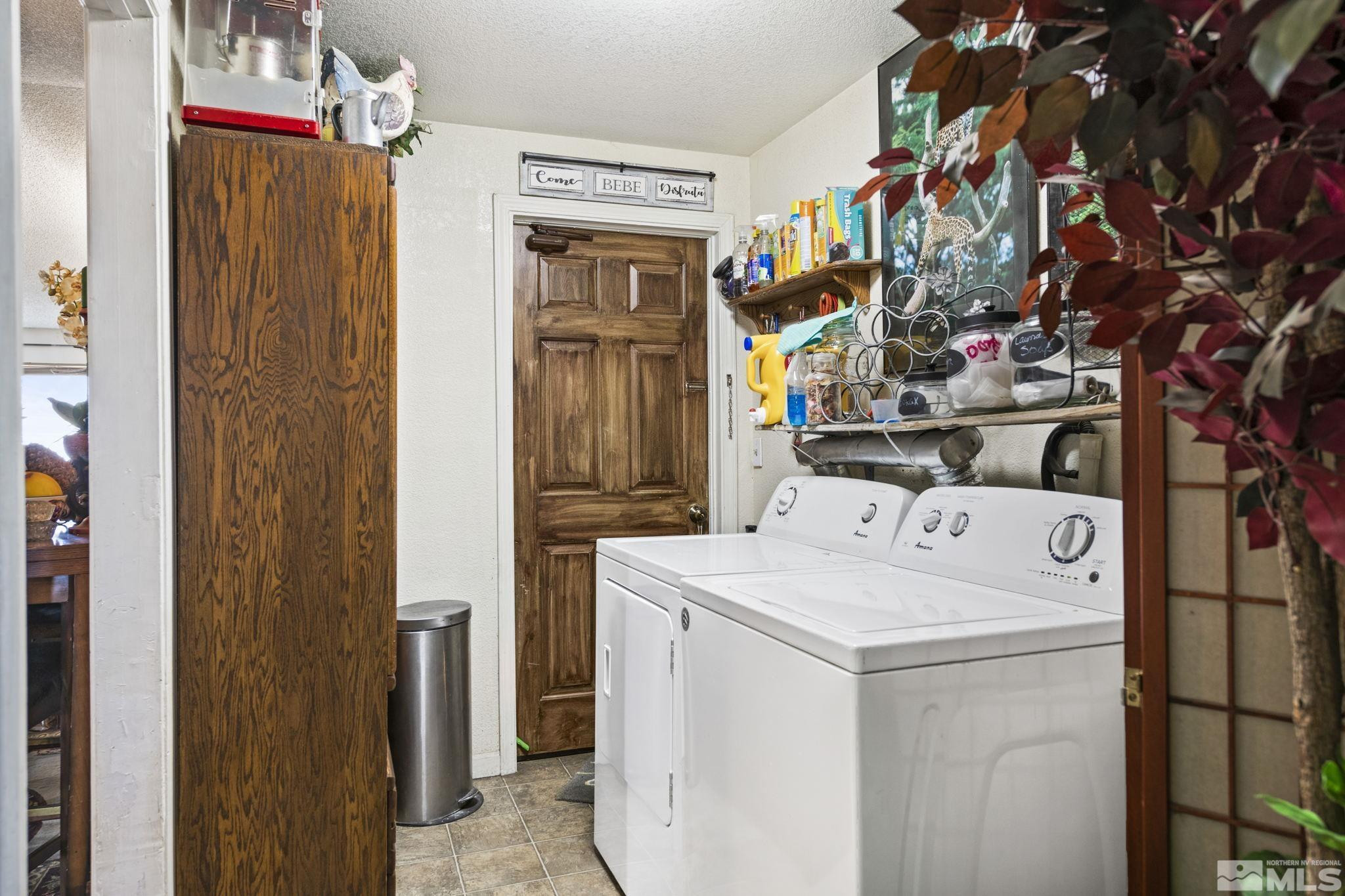 207 Ring Road Dayton, NV 89403 - Photo 18 of 40 a utility room with dryer and washer