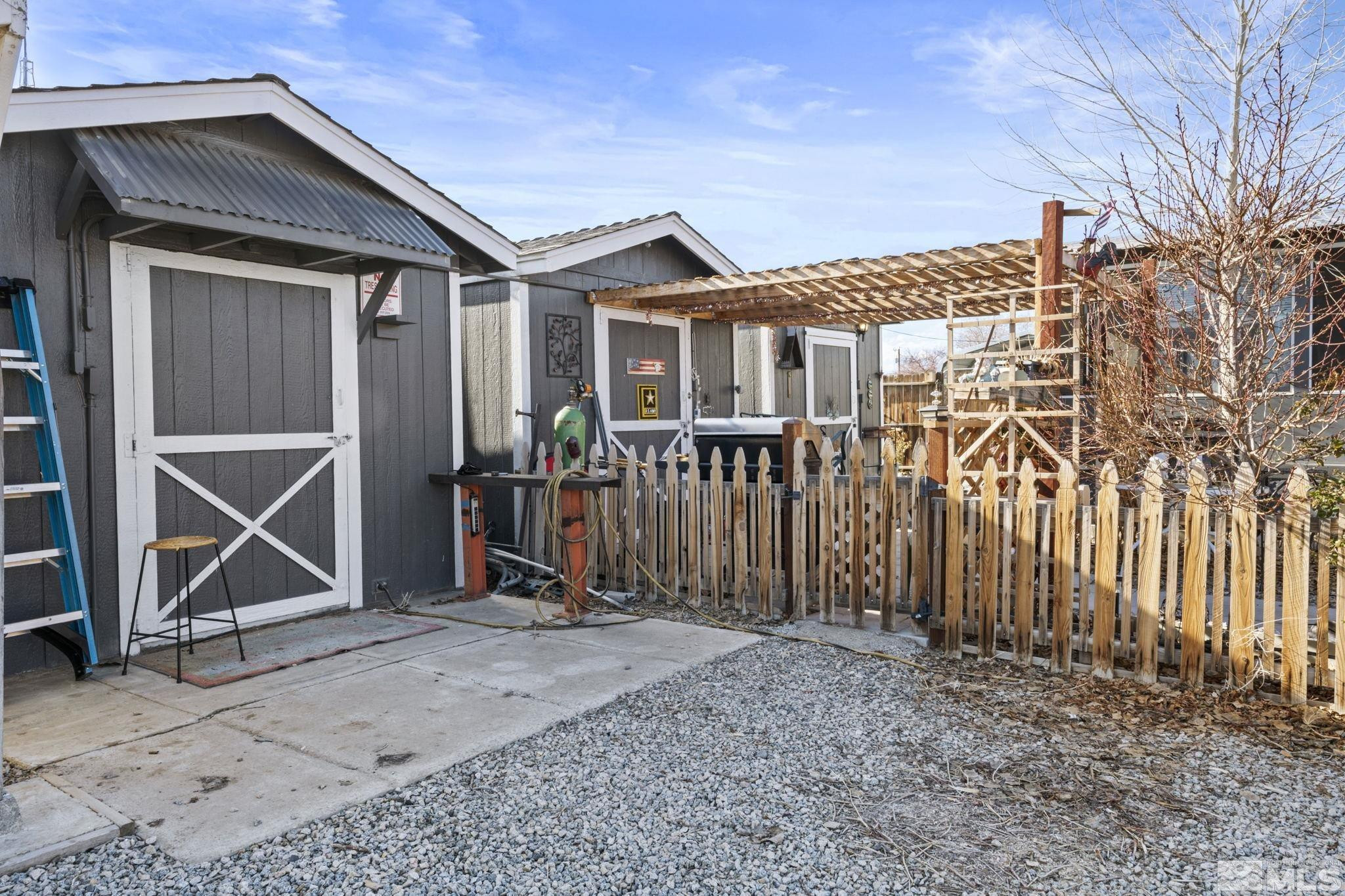 207 Ring Road Dayton, NV 89403 - Photo 28 of 40 a view of a house with wooden walls