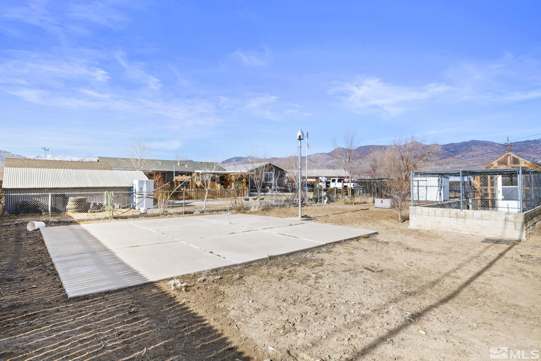 207 Ring Road Dayton, NV 89403 - Photo 34 of 40 a view of a house with a yard
