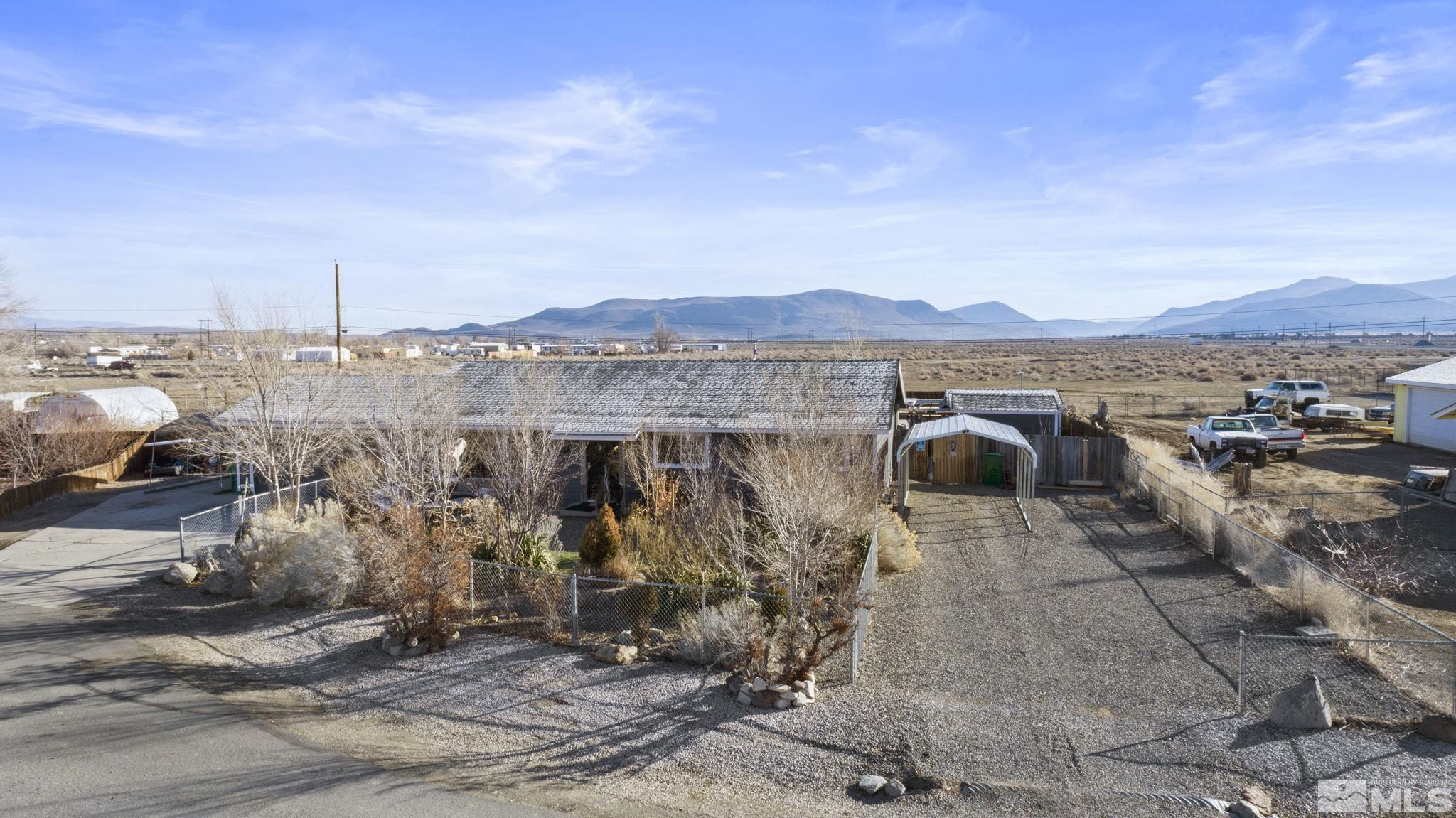 207 Ring Road Dayton, NV 89403 - Photo 37 of 40 a view of a terrace with a yard