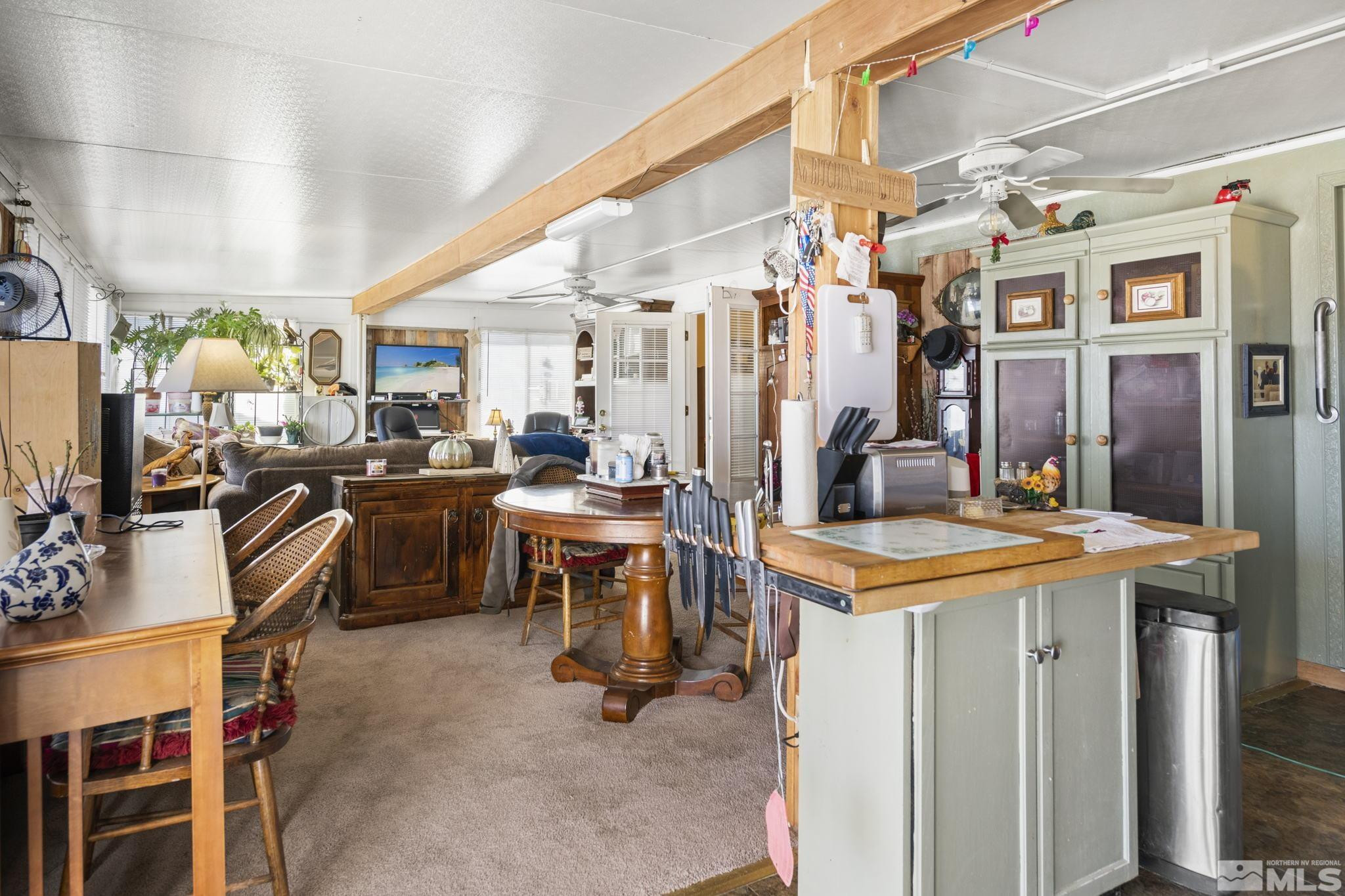 207 Ring Road Dayton, NV 89403 - Photo 5 of 40 a view of a kitchen with furniture and a kitchen