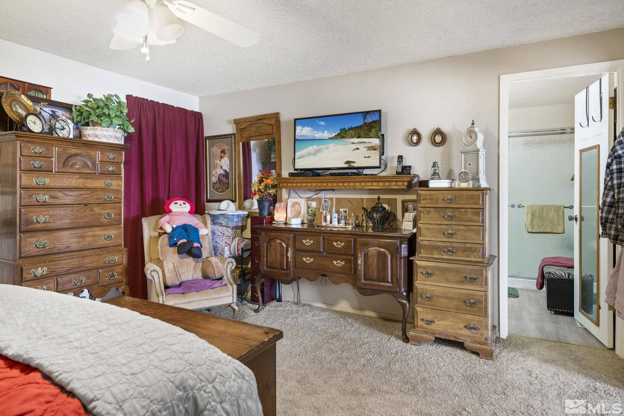 207 Ring Road Dayton, NV 89403 - Photo 9 of 40 a bedroom with a bed and furniture