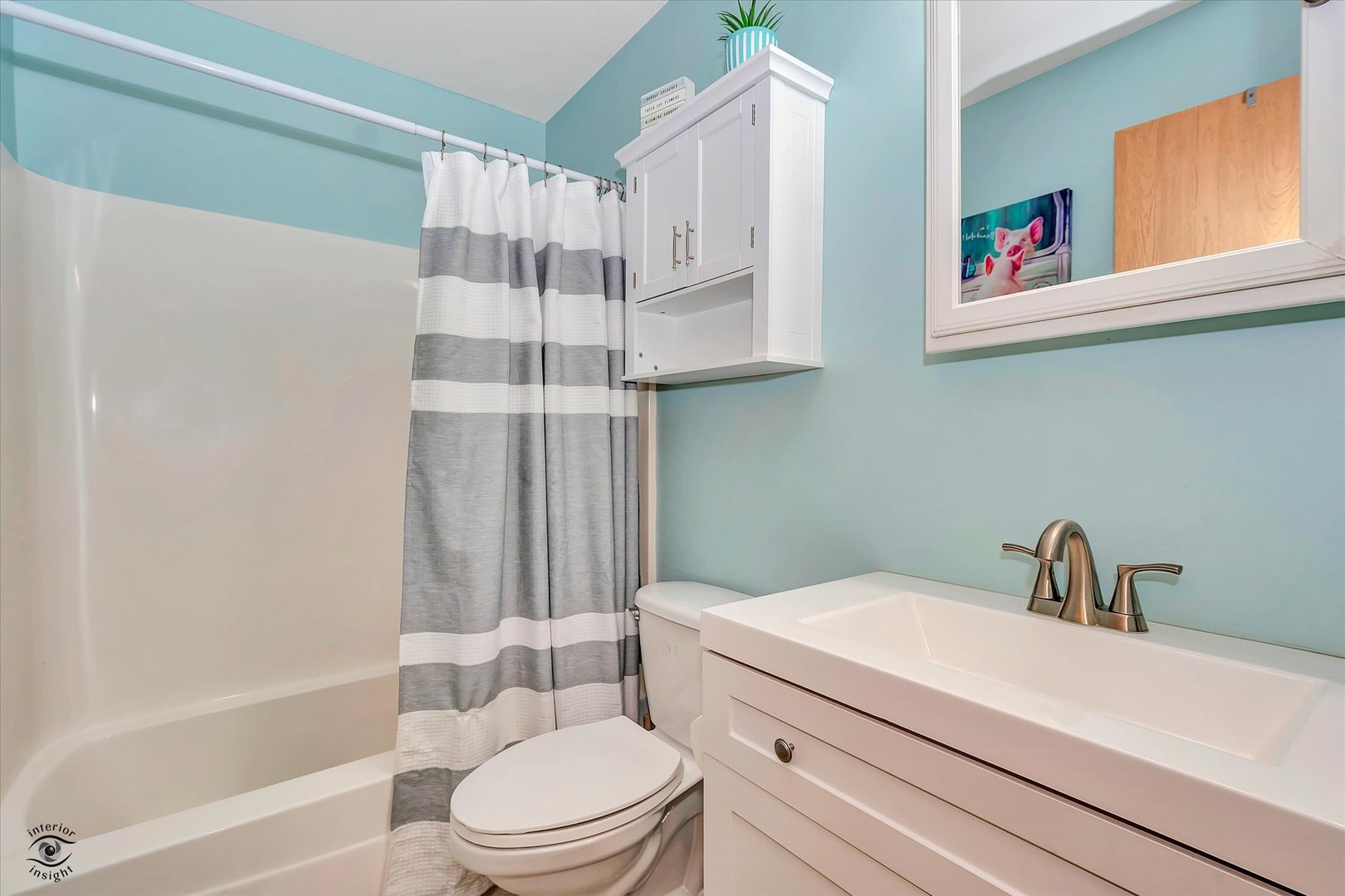 25261 Faraday Road, Unit 2 Manhattan, IL 60442 - Photo 15 of 26 a bathroom with a sink a toilet and shower