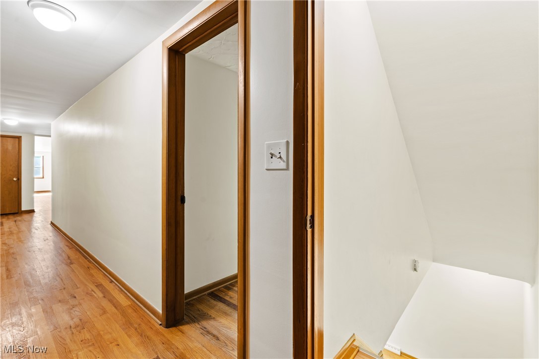 870 Trebisky Road Cleveland, OH 44121 - Photo 27 of 48 Hallway featuring light wood-type flooring