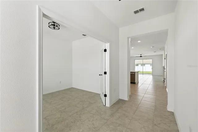 a kitchen with stainless steel appliances granite countertop a stove and a sink