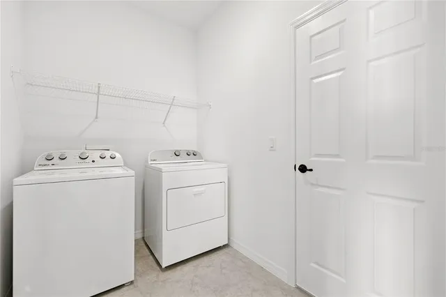 a bathroom with a toilet a sink and a mirror