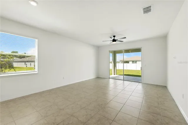 a view of storage and utility room with racks on the wall