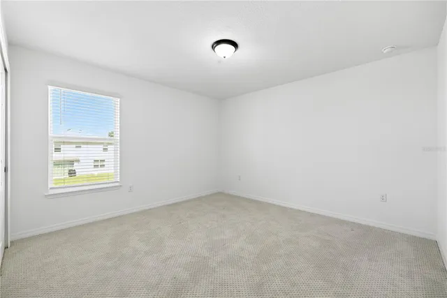 a view of a city with an ocean view