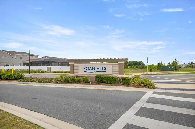 a view of a pool and a terrace