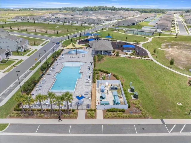 a view of a swimming pool and an ocean view