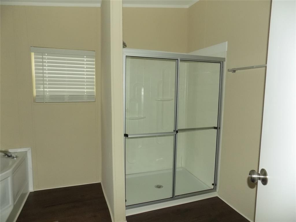 203 South Ridgeview Court Azle, TX 76020 - Photo 11 of 29 Separate shower in primary bath.