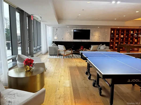 a view of a living room with furniture