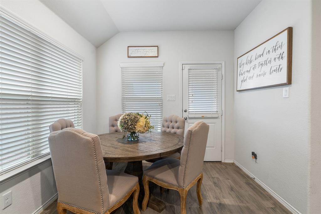 1490 Alamandine Avenue Cross Roads, TX 76227 - Photo 12 of 23 a view of a dining room with furniture and window