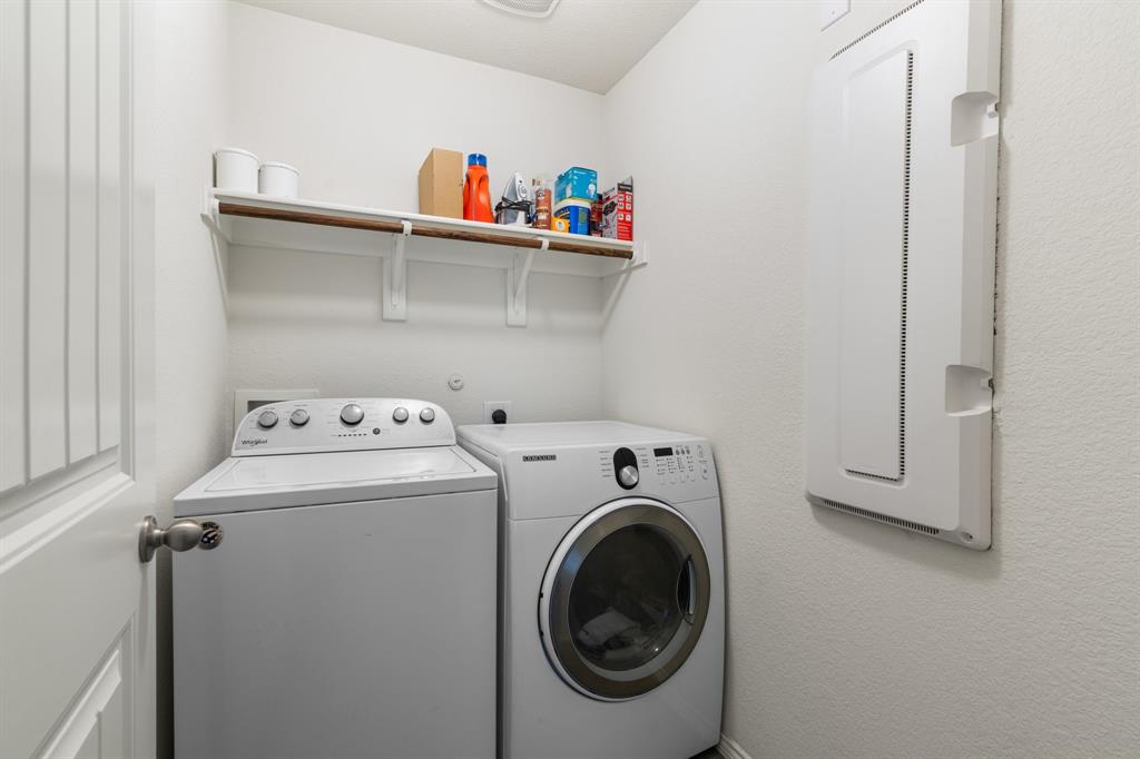 1490 Alamandine Avenue Cross Roads, TX 76227 - Photo 21 of 23 a utility room with dryer and washer
