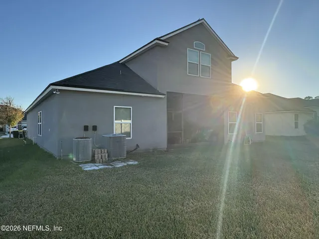 a house view with a outdoor space