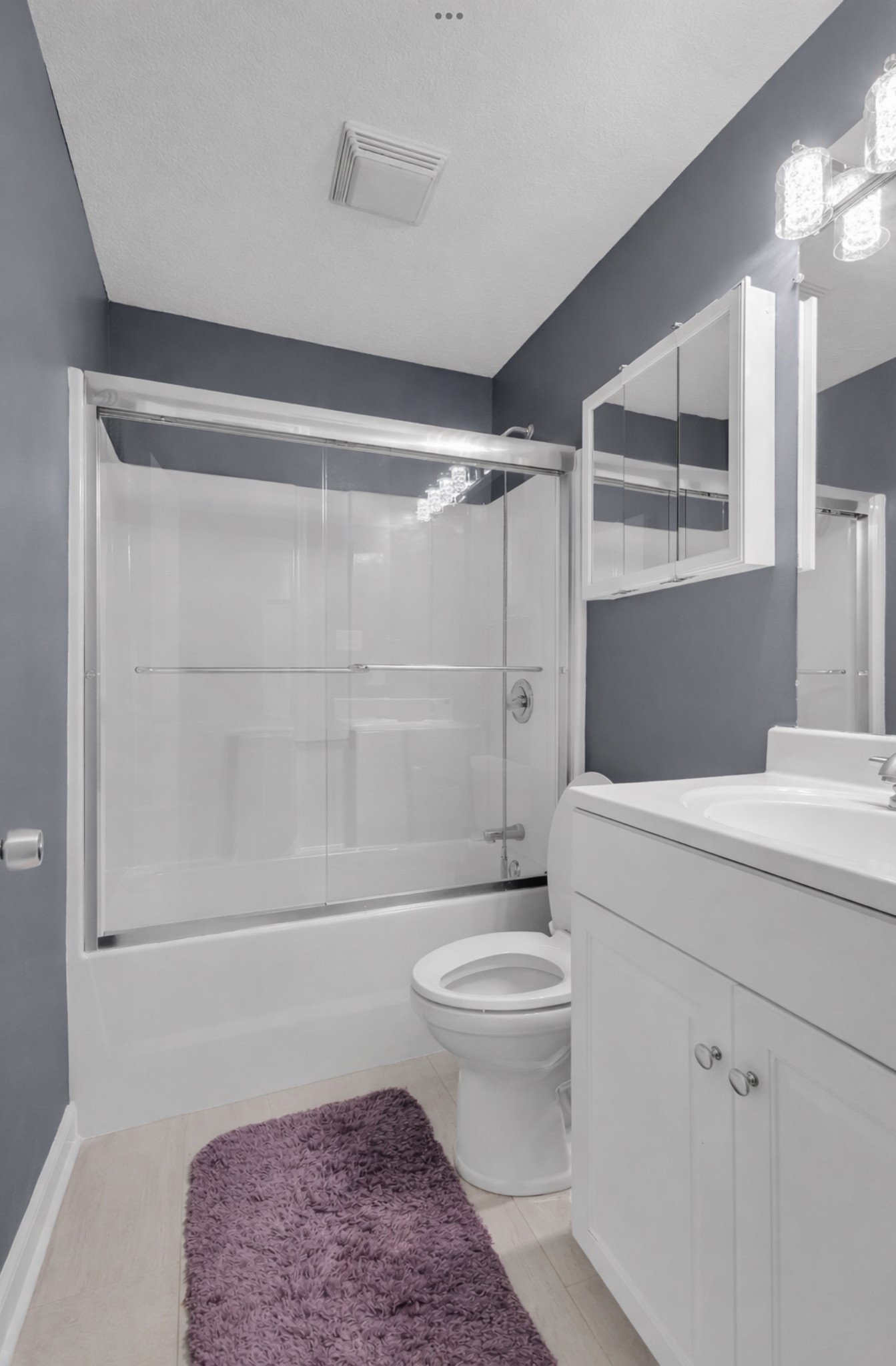 1095 Taylor Lane Newbern, TN 38059 - Photo 16 of 18 a bathroom with a sink a toilet and shower