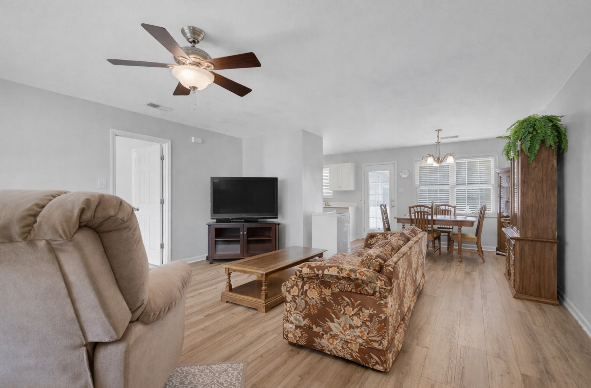 1095 Taylor Lane Newbern, TN 38059 - Photo 4 of 18 a living room with furniture and a flat screen tv