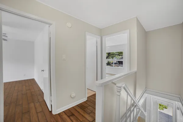 a view of entryway with wooden floor