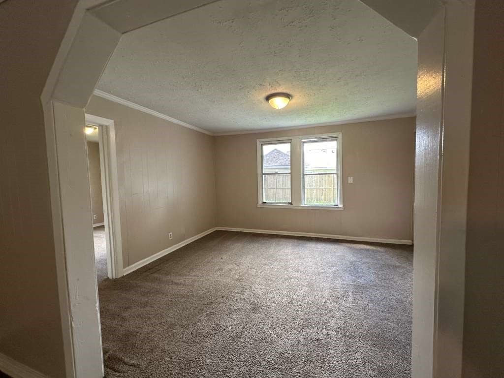 5424 San Juan Street Houston, TX 77020 - Photo 6 of 15 an empty room with windows