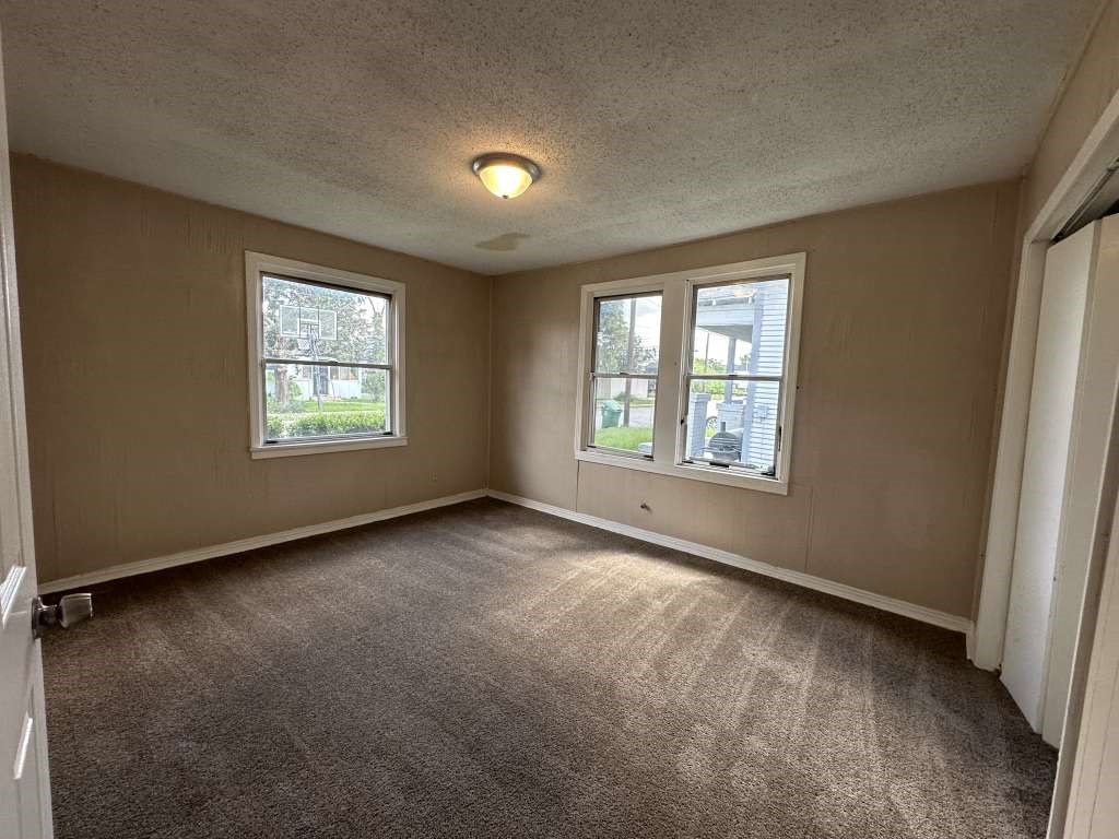 5424 San Juan Street Houston, TX 77020 - Photo 8 of 15 an empty room with windows